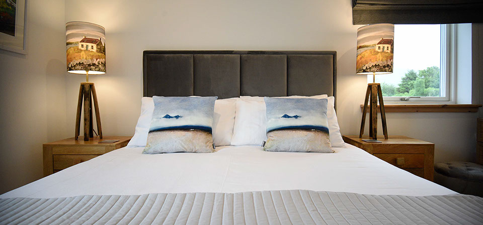 Taigh Scalpaigh bed and breakfast accommodation with comfortable king size bed and sea views of Portree Bay