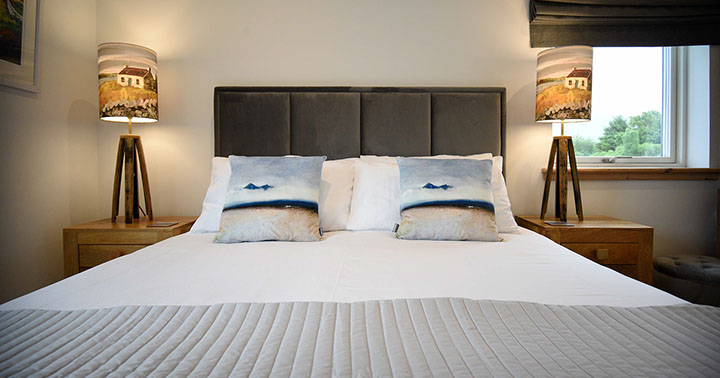 Taigh Scalpaigh bed and breakfast accommodation with comfortable king size bed and sea views of Portree Bay