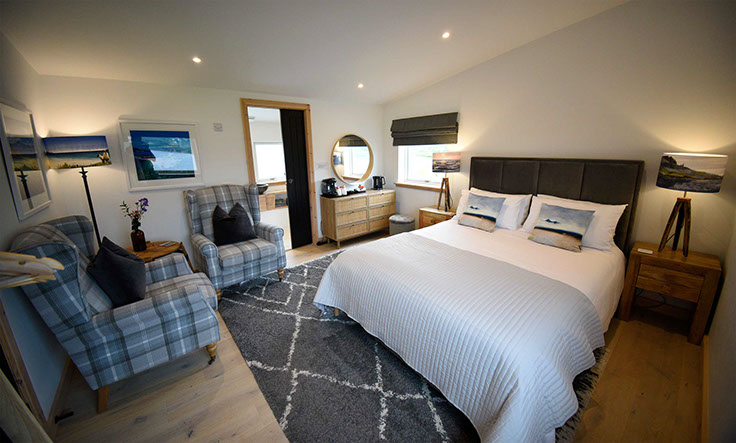Taigh Scalpaigh King size double room with en suite shower room and sea views at our Portree bed and breakfast accommodation