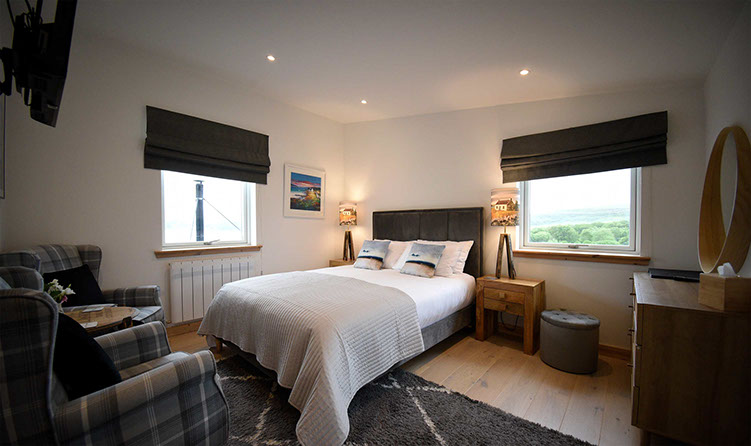 Taigh Scalpaigh Seilebost room with King size Double bed with sea views of Portree Bay